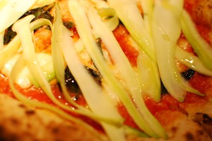 Shave the raw zucchini right onto the hot pizza pie.