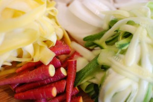 Yellow squash, spring onion, purple carrots, zucchini 