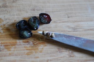 Grape seeds are fine to eat, but take them out if you want (just leave as much flesh as you can).