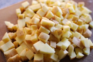About an equal amount—a cutting board full—of CSA Yukon Golds.