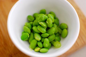 Put up in August (still in their shells), I plopped these soy beans, frozen, into boiling water for 5 minutes, shocked them in ice water, and freed them from their pods. Still perfect.